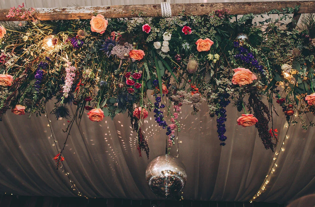 Summer Barn Wedding with Abundant Colourful Wedding Flowers